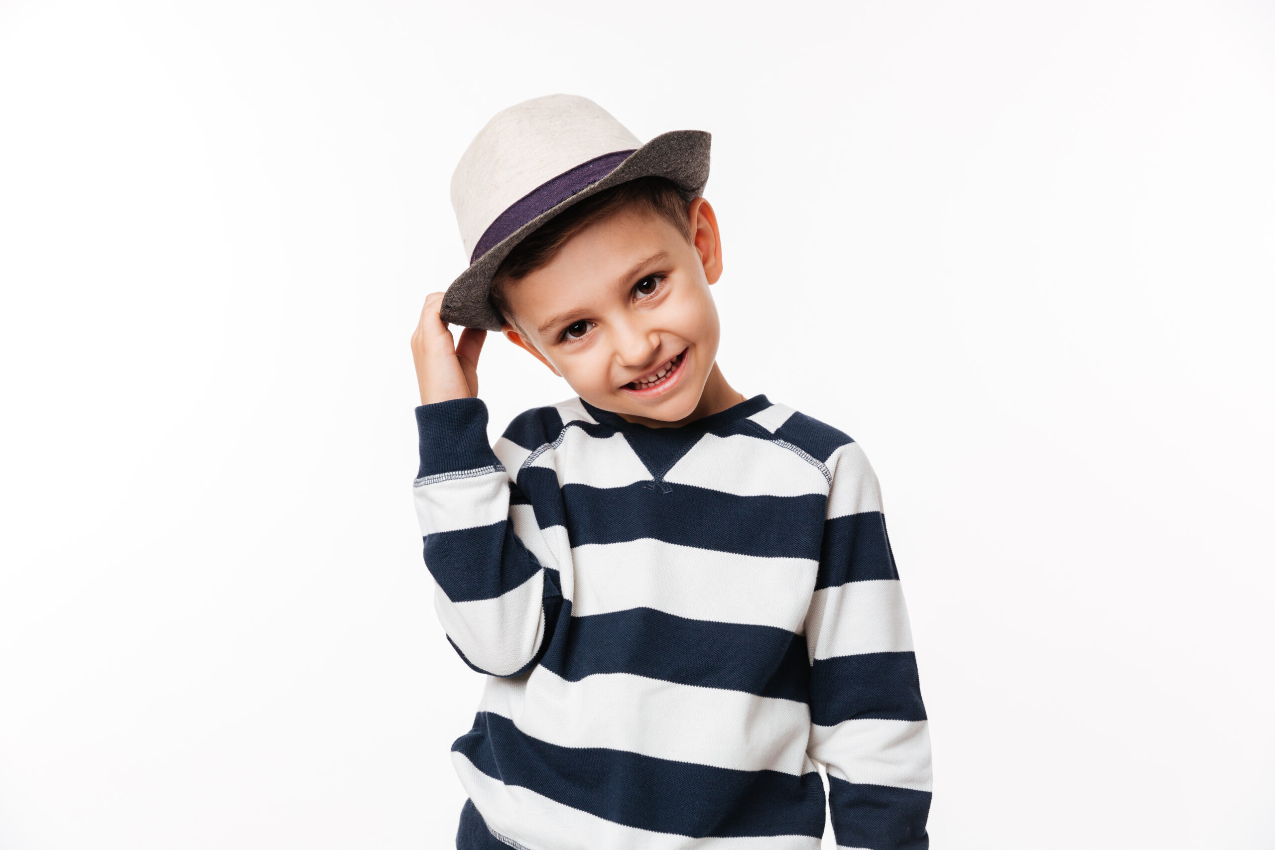 portrait of a happy cute little kid in a hat
